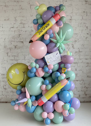 a school-themed freestanding garland