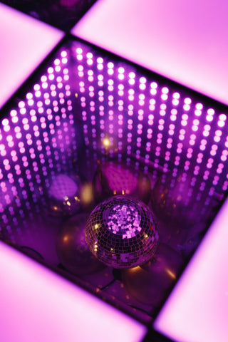 Purple disco wedding event decor with the 99 Haus Balloons and Decor custom event service