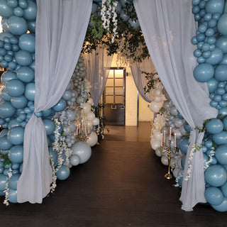 Baby blue balloon arches and wall  wedding event decor with the 99 Haus Balloons and Decor custom event service