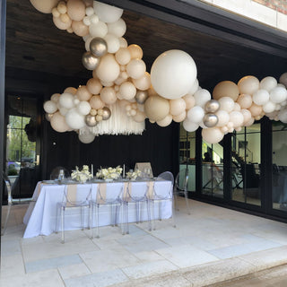 Beige balloon arch and garlands  wedding event decor with the 99 Haus Balloons and Decor custom event service