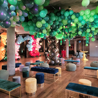 Jungle themed corporate balloon installation with the 99 Haus Balloons and Decor custom event service