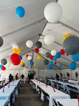 Rainbow ceiling corporate balloon installation with the 99 Haus Balloons and Decor custom event service