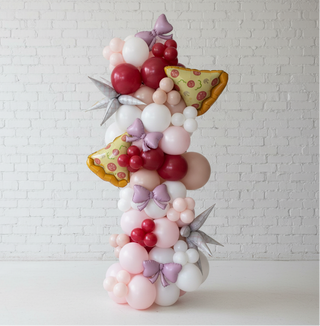 A freestanding garland featuring balloon pizzas with pepperoni, cheese, and sauce decorations, arranged with round balloons in various colors.