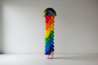 Colorful balloon arch in a modern indoor setting 