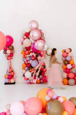 99 Haus Balloons and Decor balloon columns and ribbons