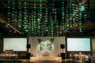Bat Mitzvah bright green butterfly ceiling installation with the 99 Haus Balloons and Decor custom event service