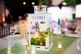 Bat Mitzvah bright green butterfly and lantern tabletop decor with the 99 Haus Balloons and Decor custom event service