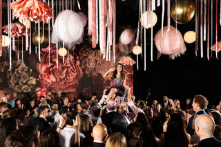 Bat Mitzvah bright pink and floral ceiling decor with the 99 Haus Balloons and Decor custom event service