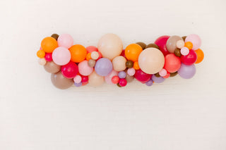 Colorful balloon garland on a white background