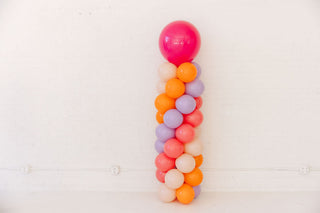 Colorful balloon column on a white background