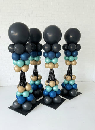 a collection of blue colored crazy towers