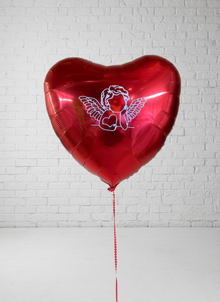 A red heart-shaped helium balloon with a metallic finish, featuring a white Cupid figure with wings and a heart motif.