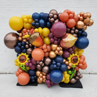 a fall themed balloon wall