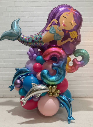 a mermaid themed mini magic column